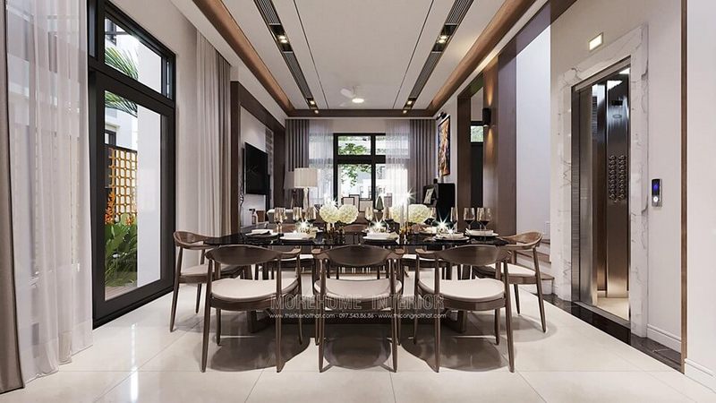 Bàn ghế ăn bằng gỗ óc chó phong cách hiện đại giúp tạo nên một không gian sinh hoạt sang trọng và cao cấp cho nội thất phòng ăn biệt thự Starlake Tây Hồ Hà Nội.